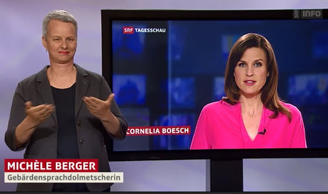 Gebärdensprachdolmetscherin Michèle Berger spricht die Tagesschau für Hörbehinderte.