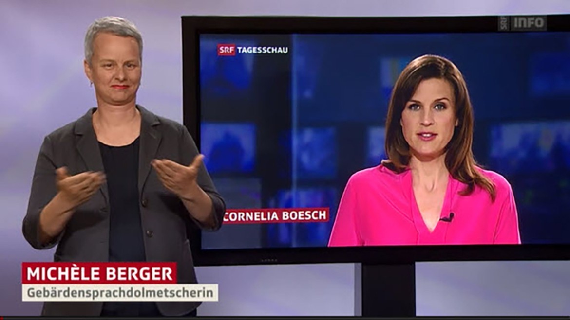 Gebärdensprachdolmetscherin Michèle Berger spricht die Tagesschau für Hörbehinderte.